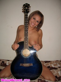 Melissa Midwest with a rock guitar #01