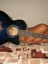 Melissa Midwest with a rock guitar #09