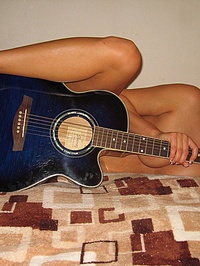Melissa Midwest with a rock guitar #10