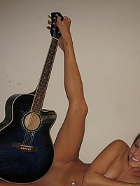 Melissa Midwest with a rock guitar #11