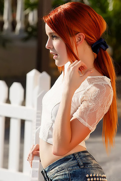 Redhead Babes Strips And Spreads Her Hot Long Legs